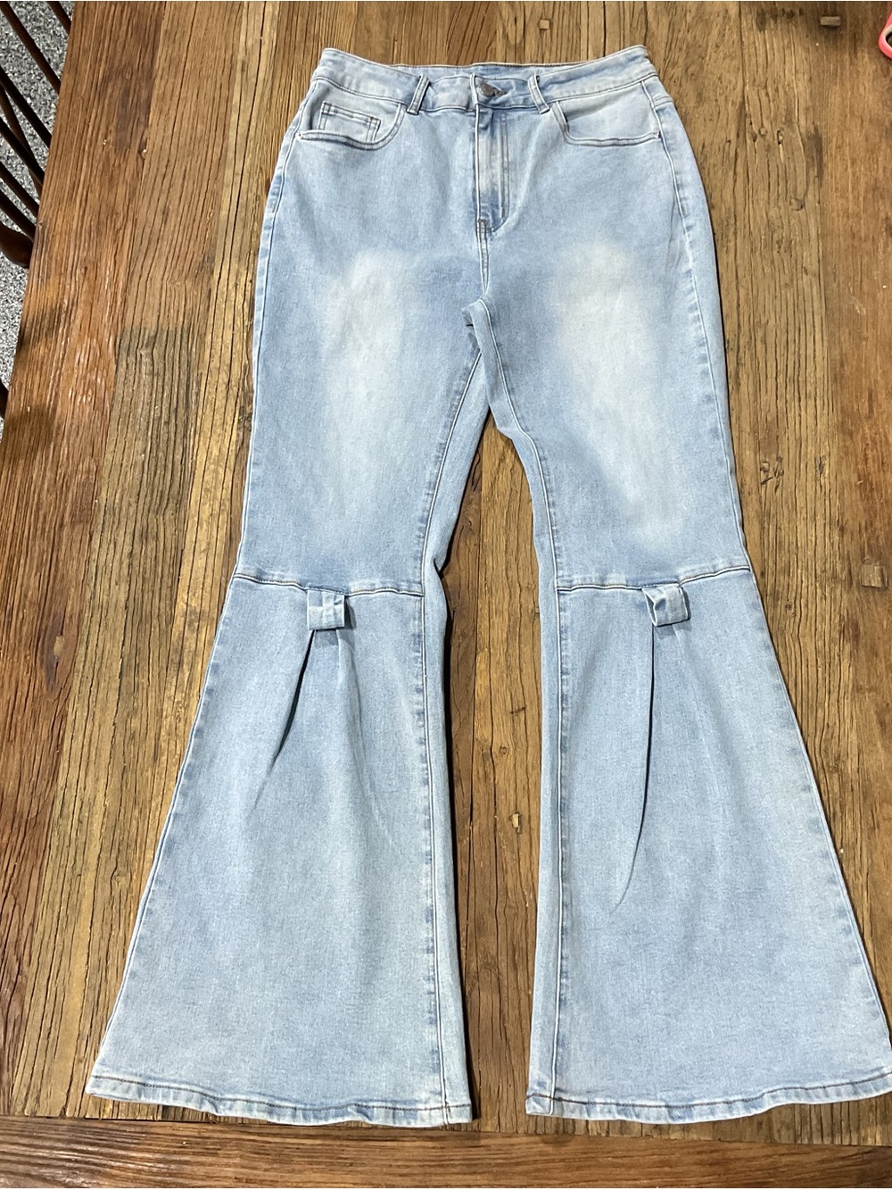 Light Blue High-Rise Flare Jeans with Knee Bow Carpenter Detail - Picture 2 of 11